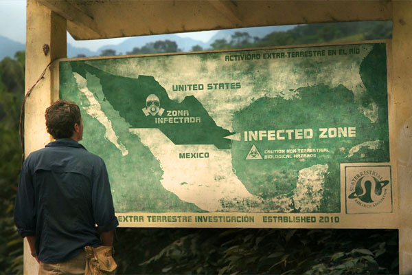 Kaulder examines a map of the infected zone in a still from Monsters